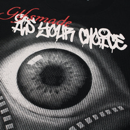 Close up of VoidVision eye graphic print on black streetwear long sleeve shirt fabric texture