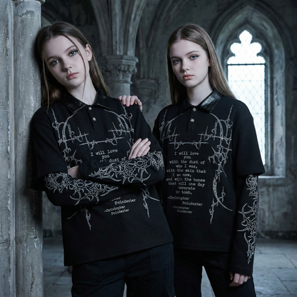 Two models wearing black gothic waffle knit tops with graphic print in dark gothic setting