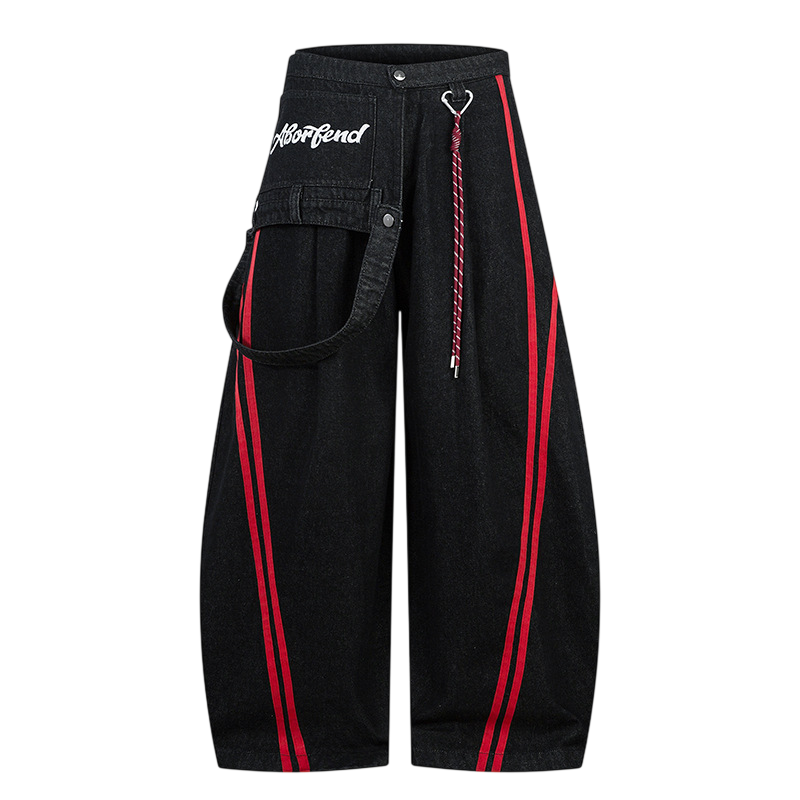 ARC BlockRogue black streetwear pants front view with red side stripes and wide leg silhouette