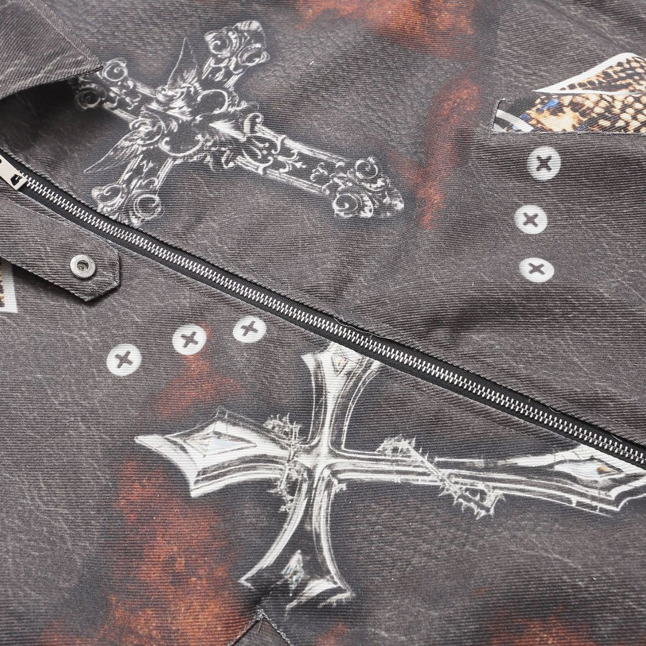 Close up detail of ARC BoxDrift jacket fabric texture and pocket stitching with graphic print