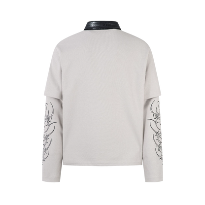 Cathedralink white long sleeve streetwear shirt back view with layered sleeve design and textured fabric